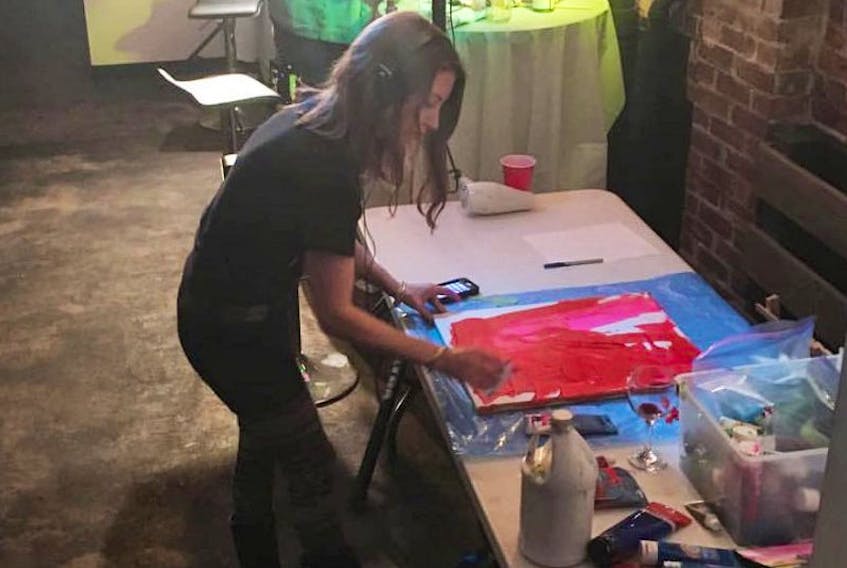 Christina MacLeod is shown during an Art At Night fundraiser, which took place in March. She is one of four artists who will be taking part in a show and sale at King of Cups in Stellarton.