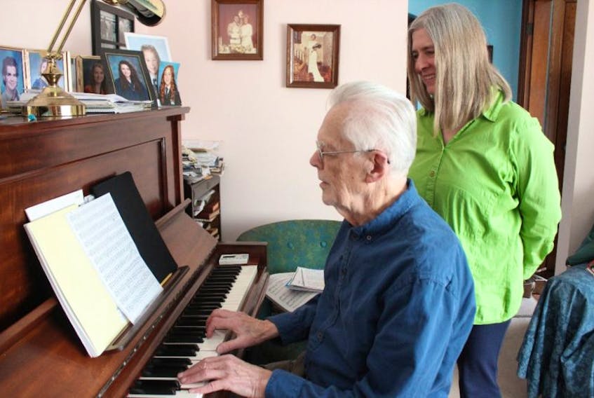 A new play created by two Pictou County residents is holding information meetings and casting calls next weekend. Pictured are George Durning, who wrote the music, playing a tune from Go To The Dickens while Deborah Stiles, who wrote the script and lyrics, sings.