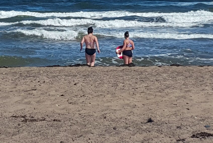 Alyssa Saulnier and Lily MacLachlan, both of Colchester County, were caught in a rip current recently at Melmerby Beach this past Friday.