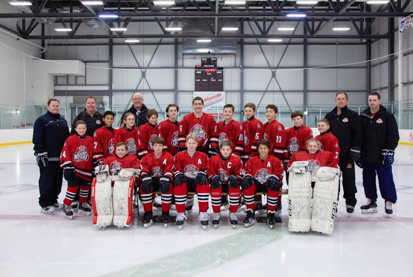 The Pictou County Peewee AAA Crushers: Front row left: Alex Palmer (G): #31, Dominic MacKenzie (D) #11, Ben Manos (D) #13, Cade Moser (F) #18, Kaden Smith (F): #3, Jorja Burrows (G): #1. In second row from let are: Lane Sim (F) #11, Amias Crossman (F): #17, Landon Steele (F) #15, Wyatt Spence (F) #8, Caden Campbell (D): #4, Ben Marchand (D): #6, Clint MacLaughlin (F): #19, Levon Walst (F): #5, Owen Conrad (D): #10, Keagen Dalton (F): #12, and Kingsley Austin (D): #7. In back from left are: Troy MacDonald (assistant coach) Jeff Green (head coach), Rick Cameron (assistant coach), Ross MacKenzie (assistant coach) and Brent Turnbull (assistant coach). Missing from photo are assistant coach Luke Austin, team manager Carolyn Steele, and affiliated players John Kay Martin (F) and Corbin MacDonnell (D).