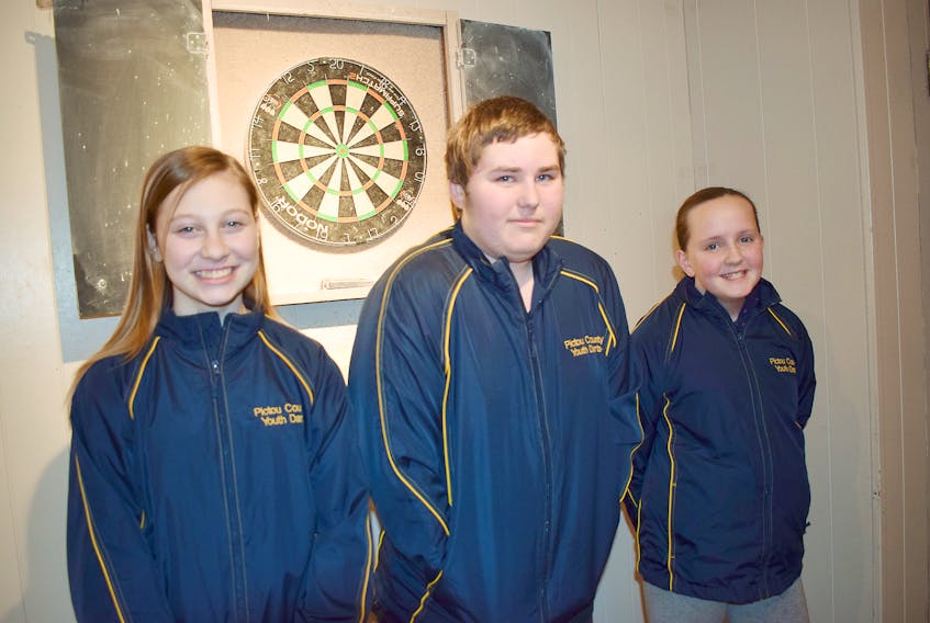 These darts competitors recently took part in the provincial playdowns in Bedford. From left are: Cierra Hawboldt (5th place), Dillon MacLellan (3rd place) and Abbey Harty (3rd place). MacLellan and Harty both qualified for the Canadian championships.