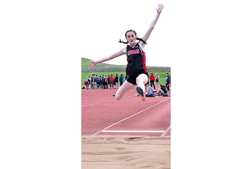 Abbie Stroud of NRHS competes in the long jump.