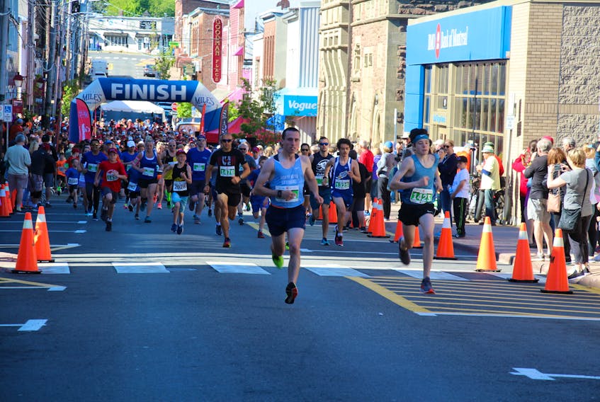 A number of runners participating in the 5K race on Sunday.