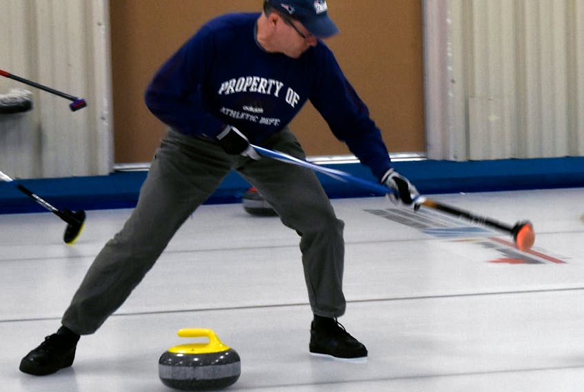 Paul Doucet of Yarmouth Curling Club watches a rock during the semifinal round of the open division of the Harding Medical Provincial Stick Curling Championship held in New Glasgow Feb. 16-17. Doucet and his teammate Dave MacDougal went on to win the competition.