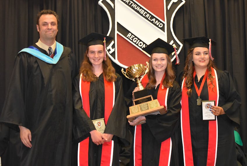 NRHS Principal Matt O’Toole is pictured with some of the top academic performers from left: Emma Cameron, Mullen Boulter and Sarah Khan.