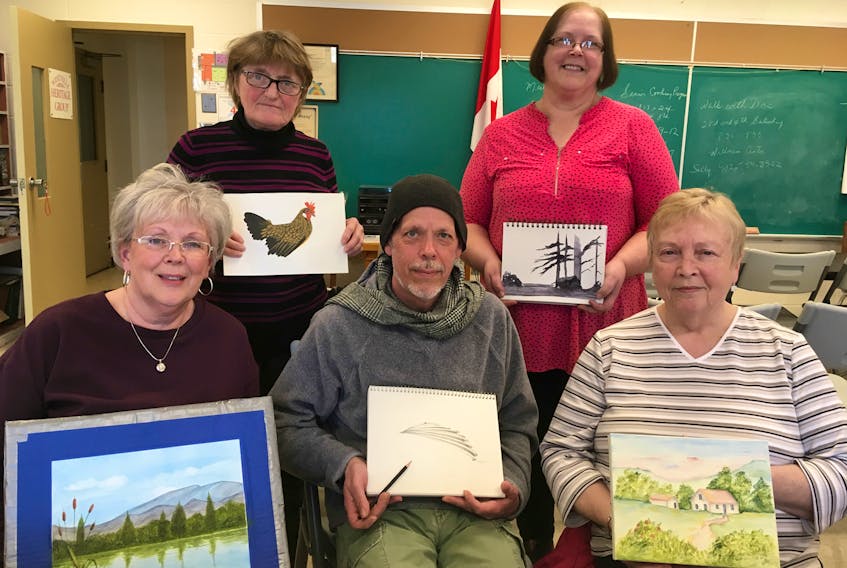 Members of the Westville Heritage Art Group spend a few hours a week sharing ideas and encouragement as they sketch and paint. From left, front, Pam Ferguson, Chris Lann and Carol MacDonald with Elaine Chabassol and Sheila Green in back.