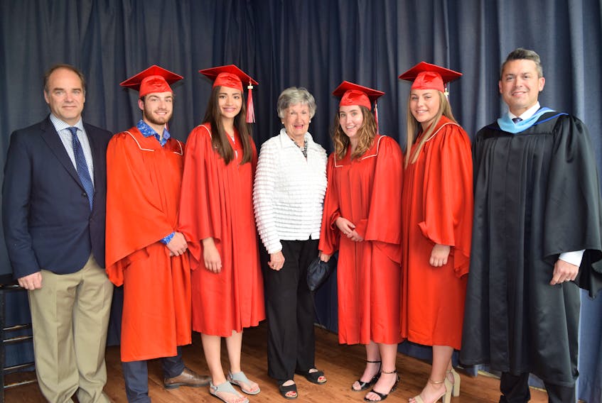 The Grade 12s at Pictou Academy held its graduation ceremony on Wednesday at the deCoste Performing Arts Centre and major award winners were honoured. From left are Pictou Academy Education Foundation chair Luke Young, Jake Temple, Helen Scammell, foundation benefactor, Erin MacMillan, MacKenzie LeBlanc and Pictou Academy principal Blair MacDonald.