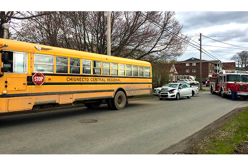 No immediate injuries were reported after a car apparently read-ended a school bus on Foord Street in Stellarton just after 2 p.m. on May 17.