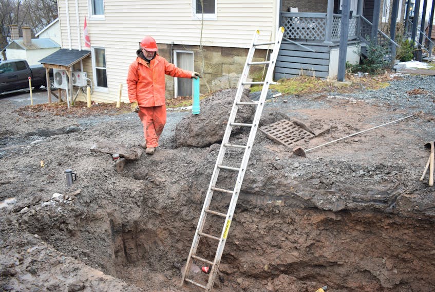 An employee with the Pictou public’s work department looks over Mother Nature’s handiwork.