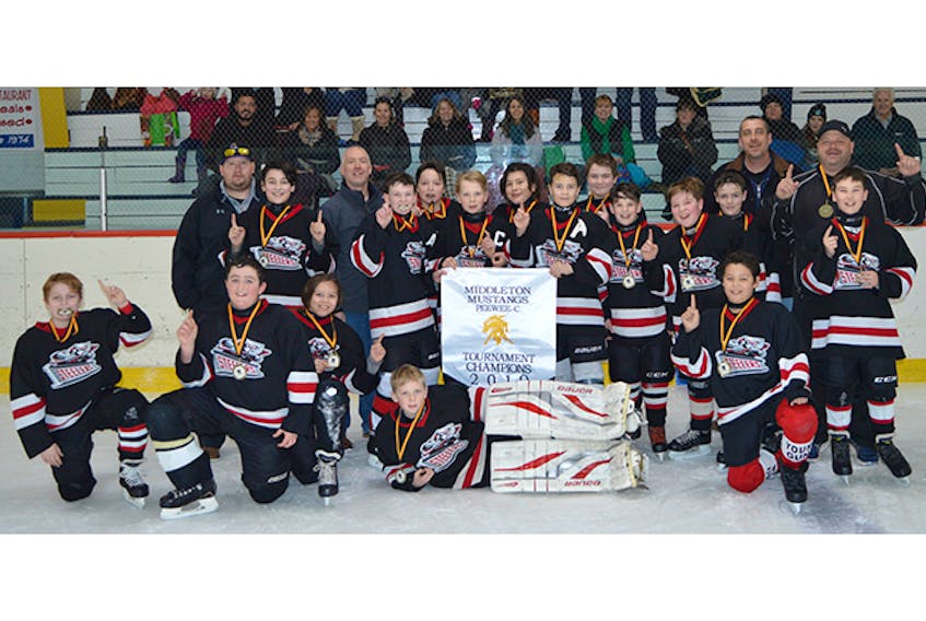 The Trenton peewee C Steelers went undefeated to nab gold at the Middleton Mustangs tournament last weekend. Members of the championship team, with their fans in the background, are, front row, from left, Ross Swinamer, Lane MacFarlane, Ethan Francis, Derrick MacKay, Seth Francis and Aiden Trowell. Second row, coach Danial Dickson, Tyson Barteaux, coach Mike MacDonald, Landon Martin, Jesse Arbuckle, Ethan MacKay, Jake Maloney, Brett Butler, Thai MacDonald, Cole MacGregor, Caden MacDonald, Carter Lennon, coach Ricky Swinamer and coach Freddy MacKay. Missing is coach Glen Butler.