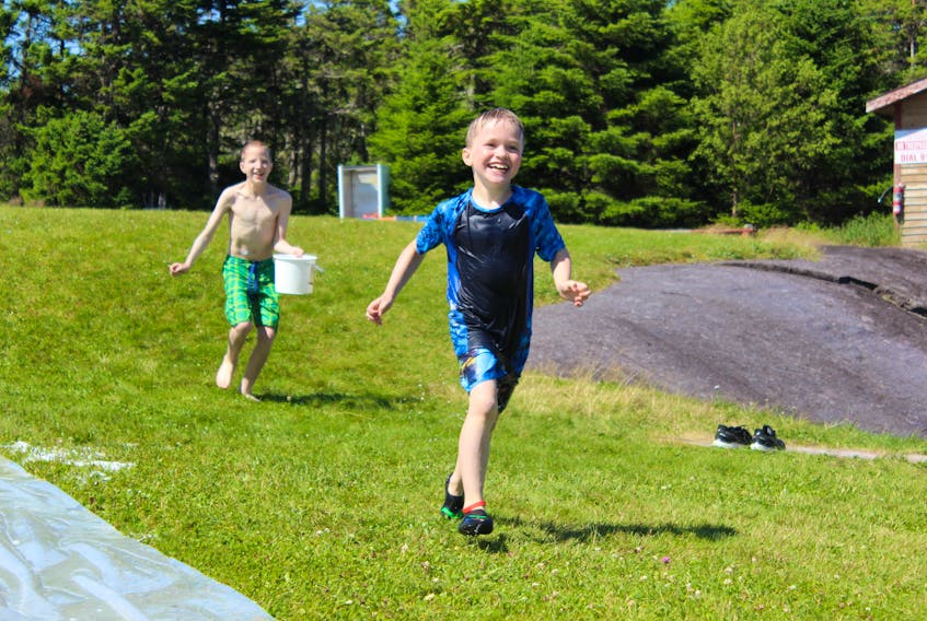 Jacob Haynes King, left, and Brody O’Brien enjoy some outdoor fun at Camp Douwanna, an annual initiative of Diabetes Canada held at Camp Lavrock on Salmonier Line.