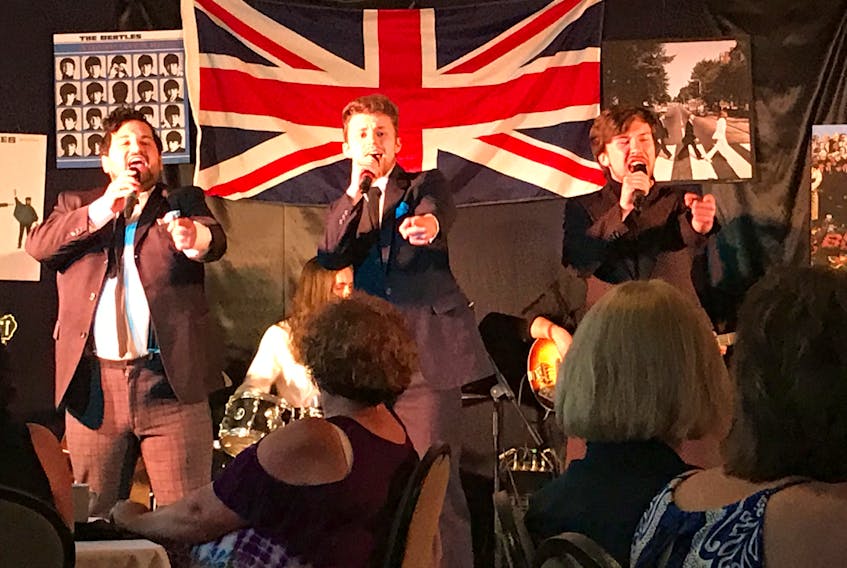 Sam Boucher, Wychita Hendricks, Andrew Perry and Seth Zocky, performers from the Stephenville Theatre Festival, hit the stage in Port aux Basques to bring the Beatles tribute show Let it Be to audiences July 24. An encore performance is planned Aug. 7. Photo by Joan Chaisson