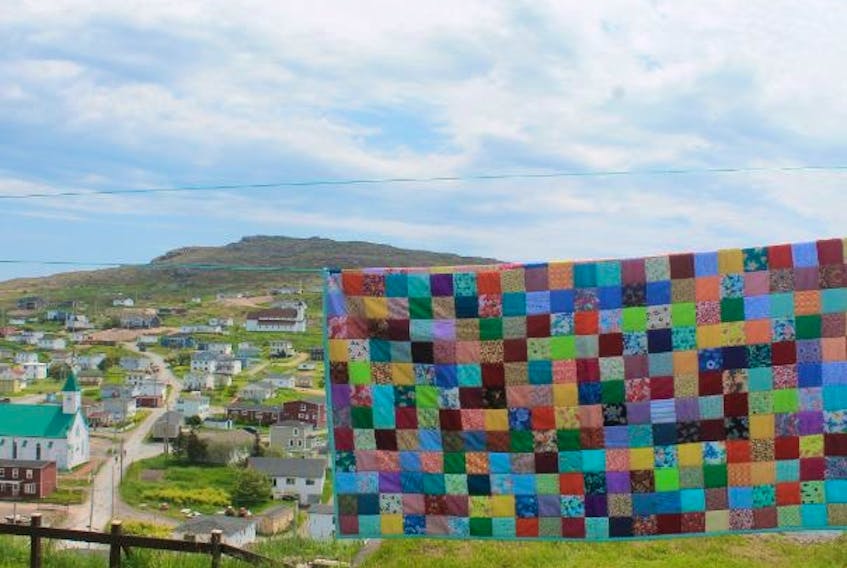 This quilt was made by Karen Riggs. Bay de Verde, where the Festival of Quilts will be held, can be seen in the background.