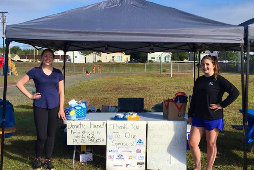 Taylor Burt, left,and Brooke Reid are the organizers of the Kill It For Cancer beach volleyball tournament being held in Bishop’s Falls for the third straight year. All proceeds from the event go towards the Canadian Cancer Society.