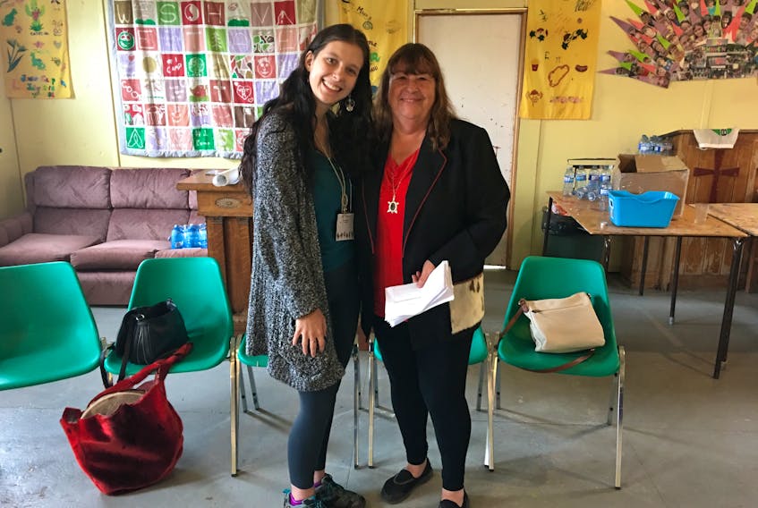 Newly elected Qalipu First Nation Band youth representative Jessica Saunders, left, with Elder Odelle Pike.