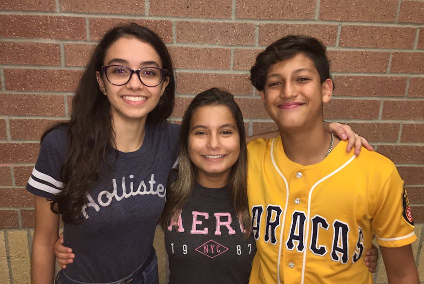 Three students from Beck Junior High in Katy, Texas, who wrote thank you letters to Gander, are from left, Laryssa De Moraes, Gabrielly Silva and Guillermo Pekle. CONTRIBUTED