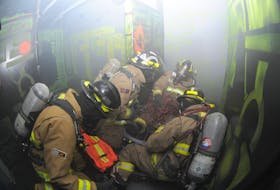 Members of the Corner Brook Fire Department do some training in this file photo. - Star file photo