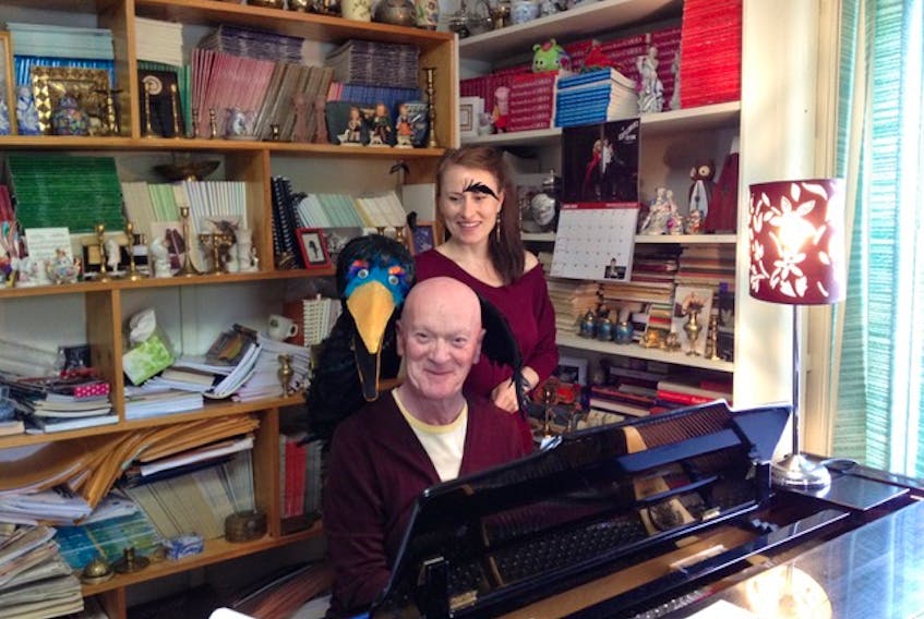 Tara Manuel and her puppet Florence accompany Gary Graham at the piano while working at his studio at the former manse on Park Street.