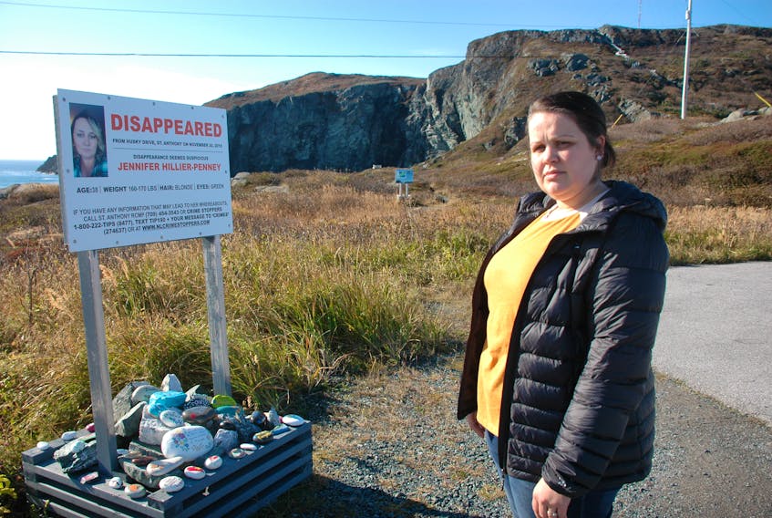 LeAnn Davis, pictured, put out a call for memory rocks to be painted for her missing aunt Jennifer Hillier-Penney. Since then, more than 40 rocks have been painted in Hillier-Penney's memory and placed underneath a missing persons sign at Fishing Point Park in St. Anthony. STEPHEN ROBERTS/THE NORTHERN PEN