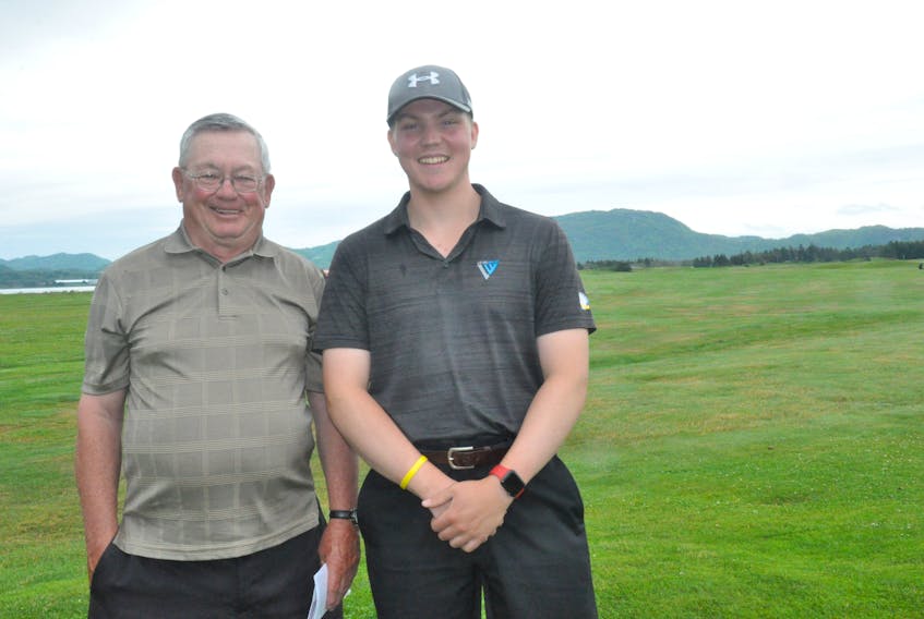 Roy Bungay, left and Ryan McNeil-Lamswood of Harmon Seaside Links had great rounds this month. Bungay, at age 77, shot a three-under-par on a “men’s night” and McNeil-Lamswood, at 19 years, a two-under-par to win the club’s Captain’s Cup. FRANK GALE/ THE WESTERN STAR