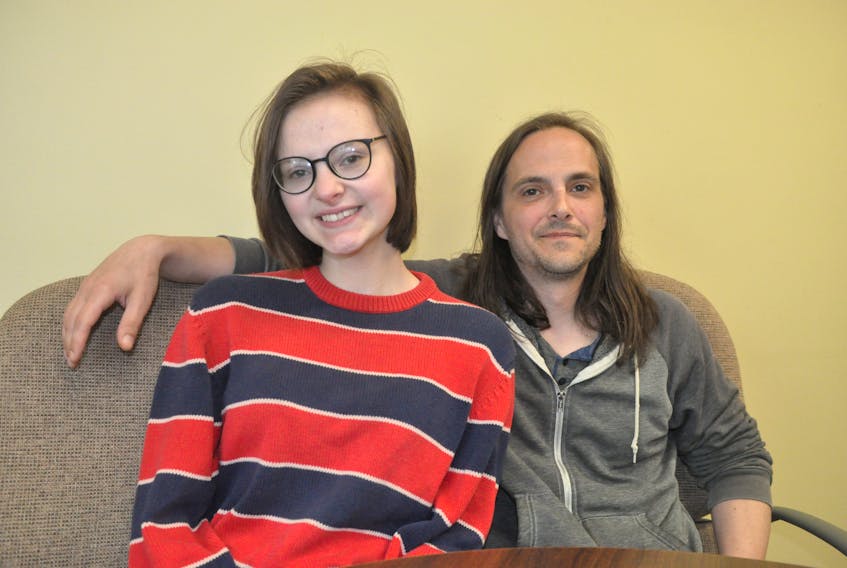 Musicians Sarah Rotchford and her dad Jamie Walsh pose for a photo at the Stephenville Festival office. The two have been hired and are thrilled to perform with the festival band this summer. FRANK GALE/ THE WESTERN STAR