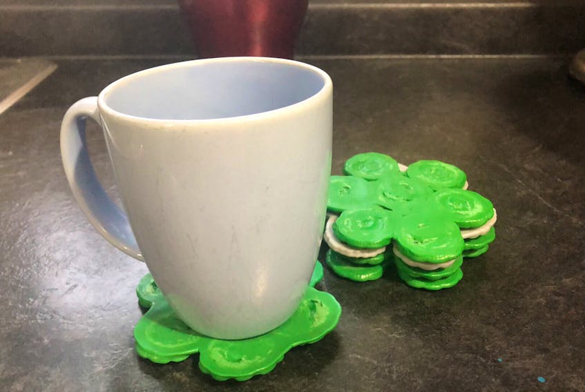 Rewind Plastics, a new Corner Brook business, is taking discarded bottle caps and turning them into new products. This flower coaster is one of the items it plans to make.