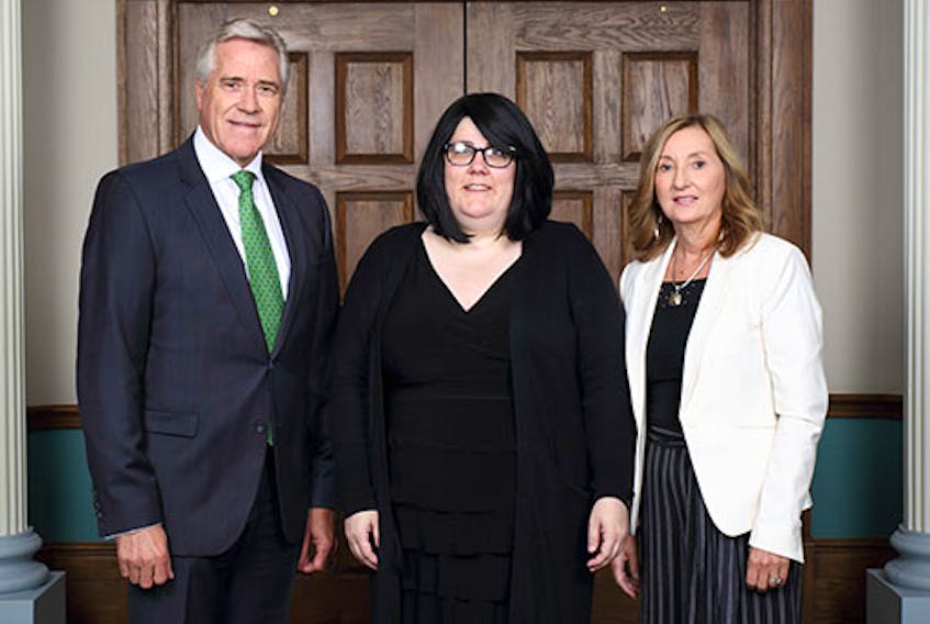 Corner Brook social worker Jacqueline Carey, centre, was recently presented with a Public Service Award for Excellence for 2018 by the province. She’s seen here with Premier Dwight Ball and Elizabeth Day, clerk of the Executive Council.