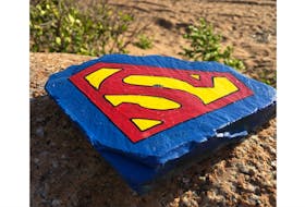This Superman rock painted by Tara Pinksen of Deer Lake will be going on tour with Ontario author Matthew Heneghan as he promotes his memoire, “A Medic’s Mind.”