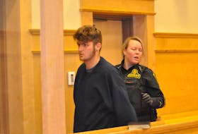 Troy Day is seen leaving provincial court in Corner Brook on Tuesday at the end of the first day of his bail hearing.