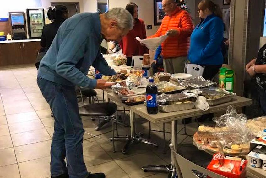 While their choices were quite limited earlier in the day, stranded airlines passengers soon had no shortage of food for their hungry bellies after the Salvation Army and other residents of Deer Lake came to their rescue later Christmas Day. - Photo via facebook (Robert Power)
