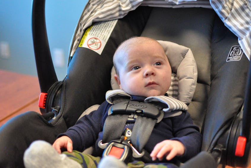 Seven-week-old Jake Wareham is safety strapped into his car seat. The base that holds the seat was installed in his mom’s vehicle and the seat was checked for a proper fit during a recent car seat clinic at the Family Outreach Centre in Corner Brook. Jake is the son of Robyn and John Wareham