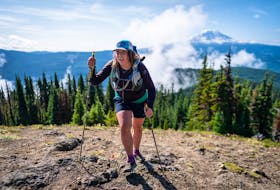 Michaela Pye makes her way across a mountaintop during an ultramarathon race.