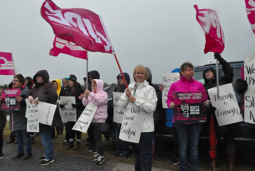 Licensed practical nurses and personal care attendants, along with some supporters, were out protesting mandated overtime at the Bay St. George Long Term Care Centre in Stephenville Crossing on Thursday. FRANK GALE/THE WESTERN STAR