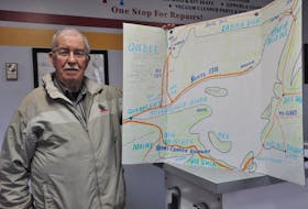 Bill Pilgrim of Stephenville stands with a drawing he recently made for his presentation to the Southwest Coast Joint Council. He spoke about the proposed fixed link at Belle Isle in relation to the current ferry service across the Gulf of St. Lawrence. FRANK GALE/THE WESTERN STAR