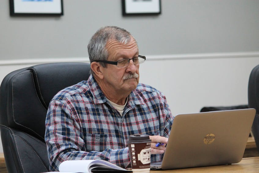 Coun. Maurice Hynes, the Town of Stephenville liaison with the Stephenville Airport Corporation, listens to the discussion at last Thursday’s public town council meeting. FRANK GALE/ THE WESTERN STAR