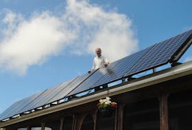 The solar panels on the roof of Tom Rose's home on Hillier Avenue, Stephenville, allow Rose and his wife to live off the power grid.