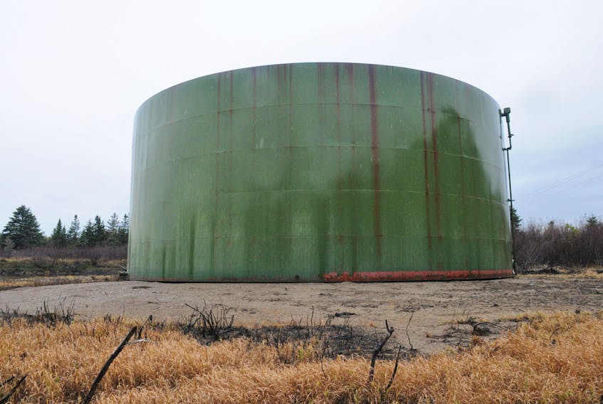 This large fuel tank, located just off the road leading into Mine Pond in Stephenville, moved from its original site after a heavy rainfall this year. The sandy area in this photo is where the tank used to be located.