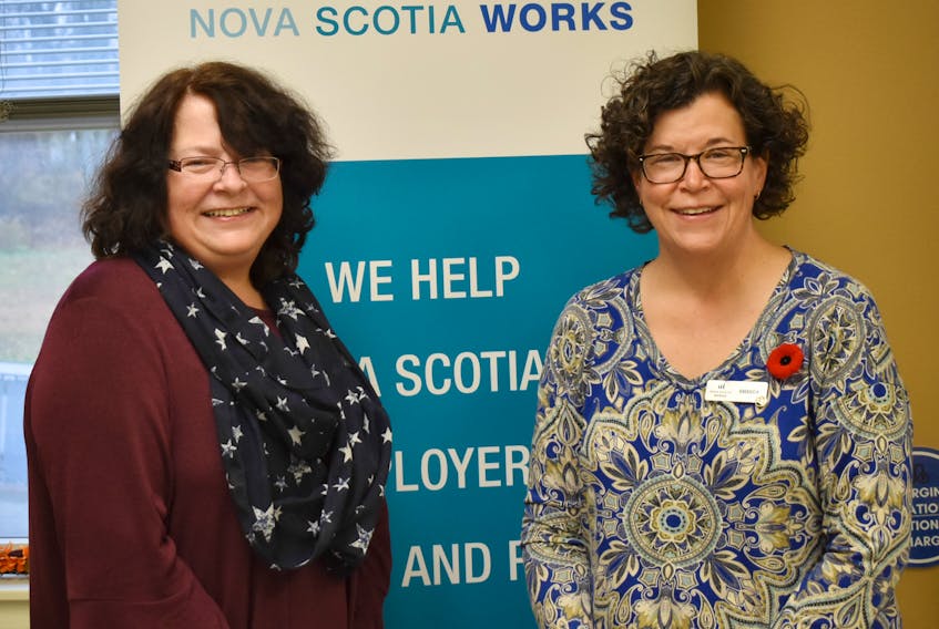 Heather MacIsaac, left and Amanda White work at the Nova Scotia Works Employment Service Centre in New Glasgow and say things are looking up in the job market in Pictou County.