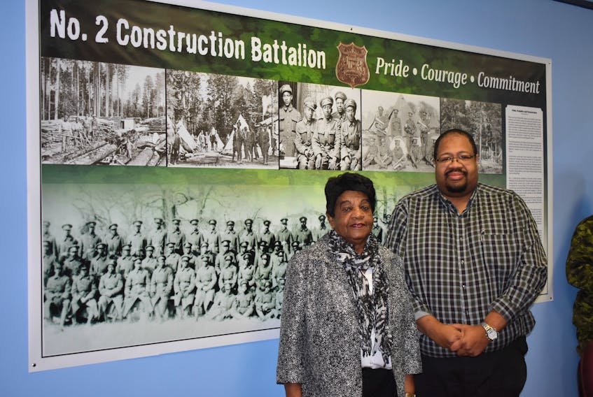 Annie Reddick, daughter of No. 2 Construction Battalion member Isaac (Ike) Desmond, had the honour of unveiling a display, which honours the battalion that’s been hung in the Construction Engineering Flight board room in Pictou. She is pictured here with Russell Grosse, executive director of the Black Cultural Centre.