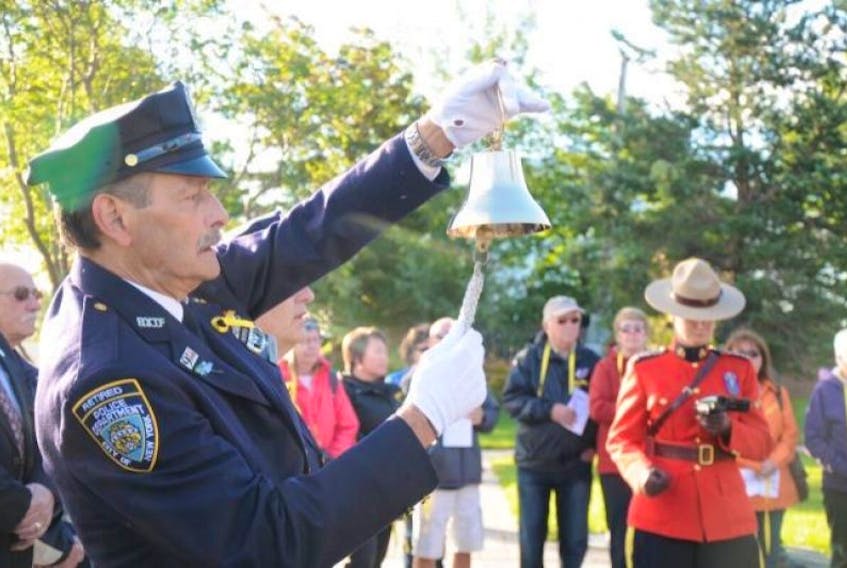During a 9-11 memorial service in Gander, held by a 12-person delegation from the United States, retired NYPD officer Joe Agron, was one of two officers to sound a bell symbolizing the strike and collapse of the twin towers.