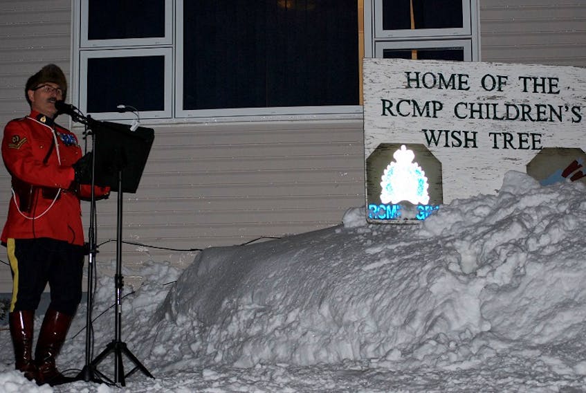 Cpl. Mark Hustins addressed those gathered for the opening of the Mary’s Harbour RCMP’s Wish Tree on Tuesday, Dec. 4.