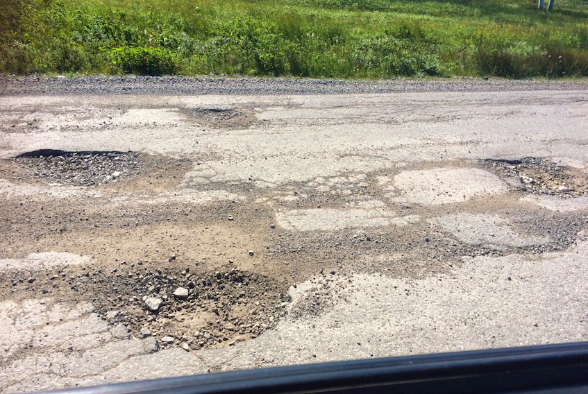 Potholes on Grenfell Avenue in Flower’s Cove.