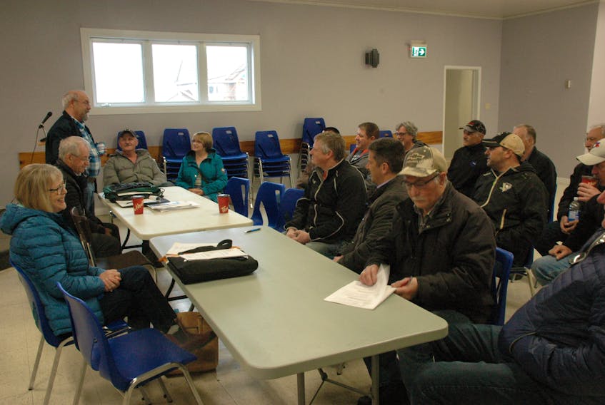 Ward Samson (standing), of Main Brook, spoke to fellow salmon anglers during the Citizens Outdoors Rights Alliance meeting in St. Anthony on Wednesday, June 13. - Stephen Roberts