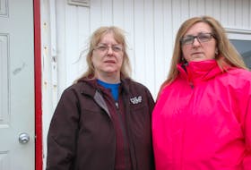Michelle Dredge (left) and Eva Applin are two union representatives at the Black Duck Cove fish plant. They say workers want a commitment from the Quinlan Brothers to re-build their plant.