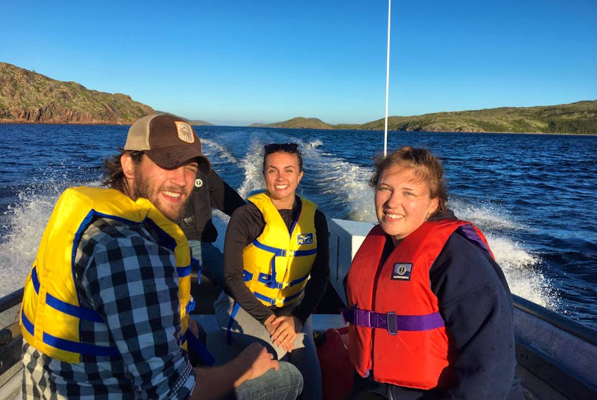 From left, Nick Mercer, Abigail Poole and Siobhan Slade head to Williams Harbour to check out a solar power installation during their research into energy security for Black Tickle, St. Lewis and Norman’s Bay.