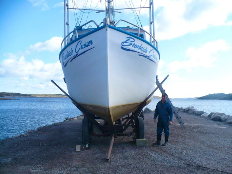 Mary’s Harbour mayor Alton Rumbolt stands next to his boat, the Beachside Cruiser. Rumbolt attended the Iceland Fisheries Exhibition with other Newfoundland and Labrador harvesters, processors and FFAW union members. They all came set on bringing Newfoundland and Labrador’s fish markets up to par with the rest of the world. Submitted photo