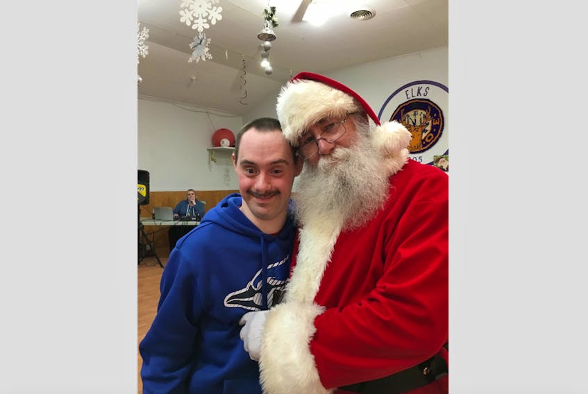 Byron Moores, originally of Red Bay, has been selected as a member of the Corner Brook Viking’s 5-pin bowling team that will compete in the 2019 Special Olympics NL Winter Games. Here he is pictured in the festive holiday spirit with Santa Claus.
