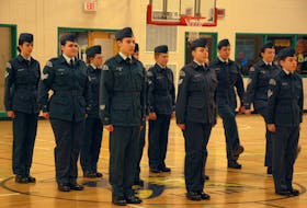 The 774 St. Anthony Air Cadet Squadron drill team comes to a halt during their performance on Wednesday evening.