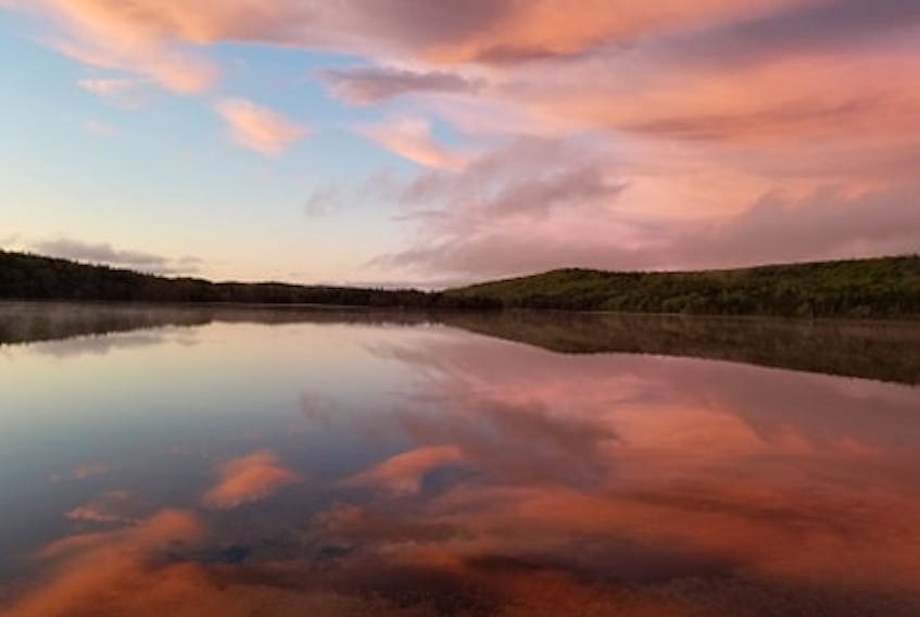 Nova Scotia always has gorgeous sunsets - each more beautiful than the last. Katelyn Jean sent this from her family's land at Gillis Lake, N.S. She loves how the water reflects a perfect mirror image upside down.