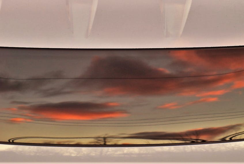 This cool photo angle is courtesy of Sylvie Theriault in Cole Harbour, N.S. She wrote, "...enjoyed watching some nice pink clouds going by during sunset this evening from the comfort of my home. Here's some reflections I captured on my vehicle sunroof." Thank you for the cotton candy clouds, Sylvie.